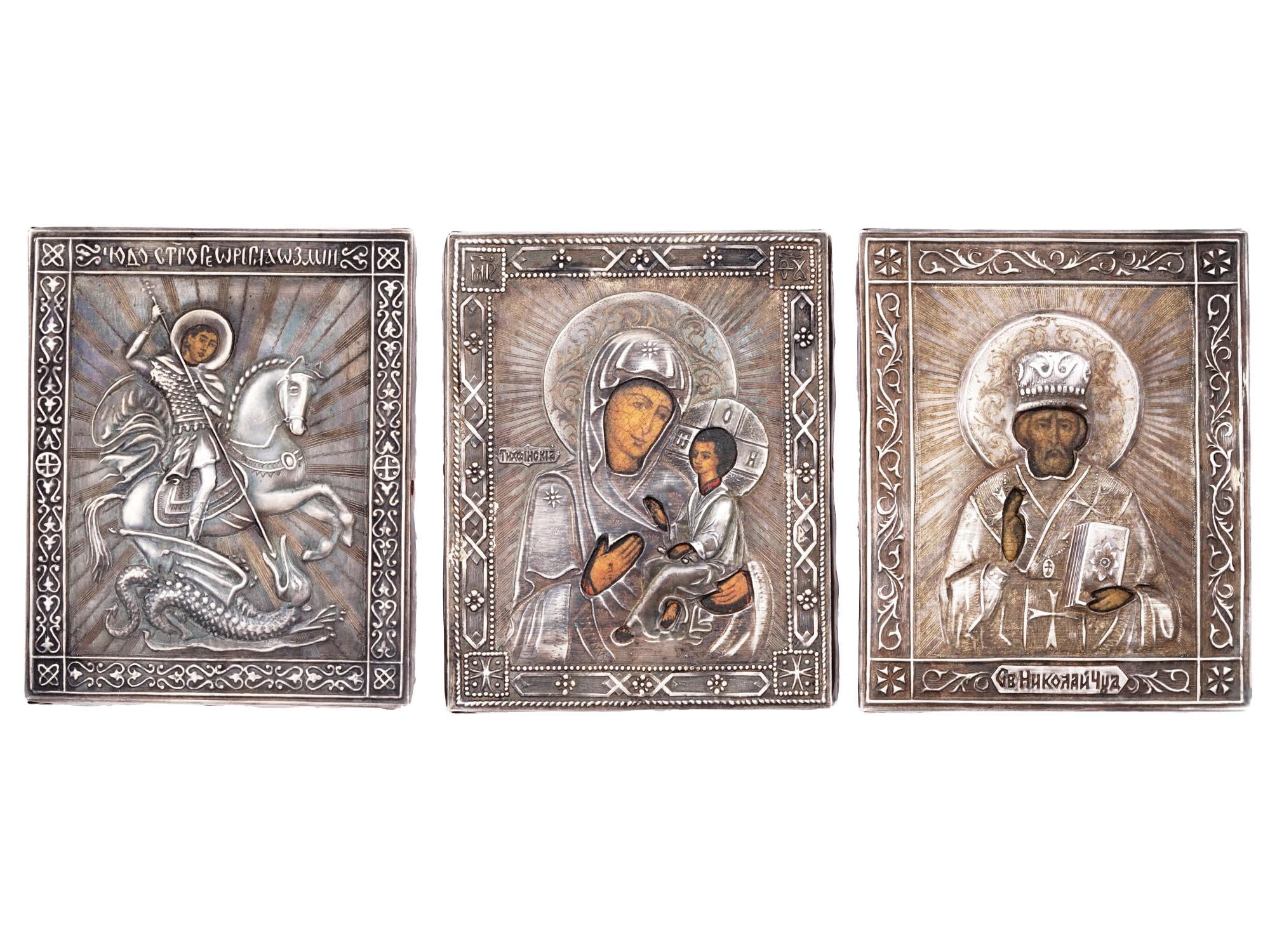 RUSSIAN ICONS OF SAINTS IN SILVER REPOUSSE OKLAD